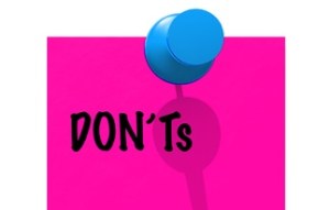 Blank and DOs and DON'Ts memo papers attached with green and pink pins.